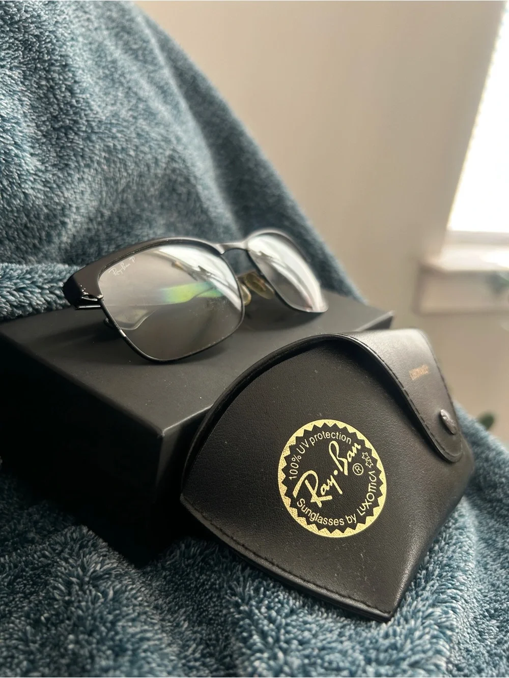 Ray-Ban Black Sunglasses with Silver Lenses